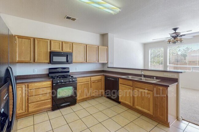 Building Photo - 6512 Los Pueblos Pl NW