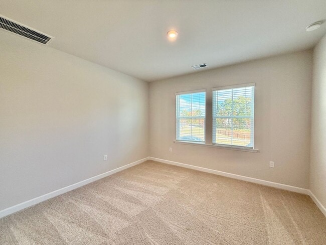 Building Photo - **OFFERING RENT PROMOTION FOR FIRST 6 MONTHS** New Construction 4BD, 3.5BA Wake Forest Townhome w...