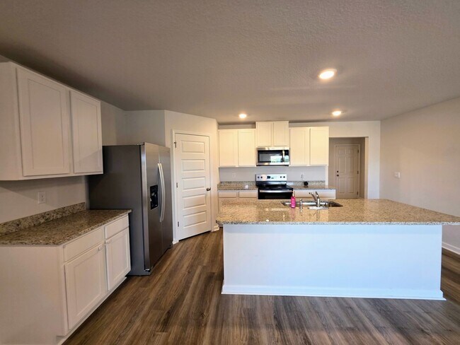 Building Photo - Nearly New 4BR/2BA home close to I10 with energy savings built in