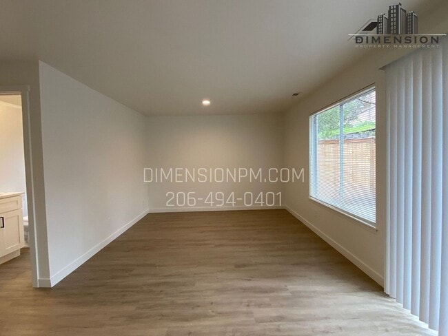 Building Photo - Stylishly Renovated Home with Private Back...