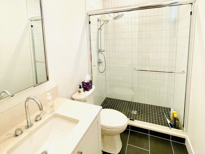 Attached bathroom with large shower - 4127 40th Ave SW