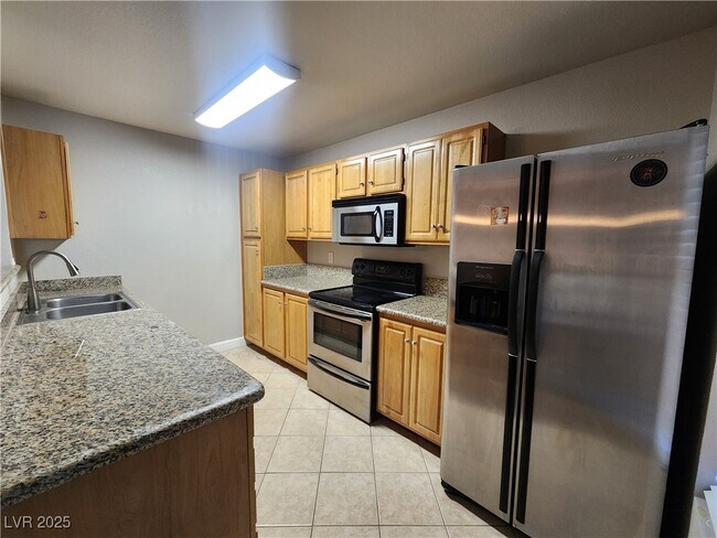 Building Photo - 5055 W Hacienda Ave