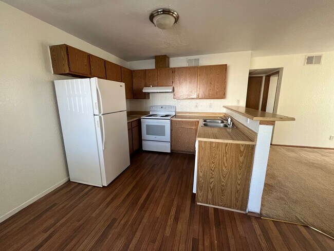 Building Photo - Best kept Fourplex- Mature Landscaping