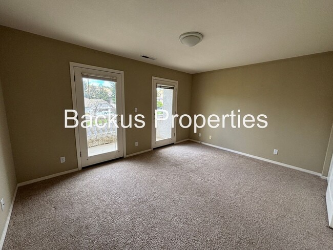 Building Photo - Great two-level home in Las Palmas II with scenic views