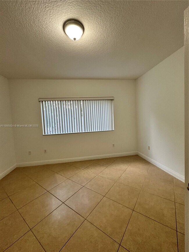 Building Photo - 10700 NW 66th St