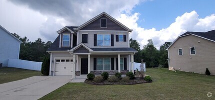 Building Photo - Spacious 4 Bedroom, 2.5 Bath Two-story Hom...