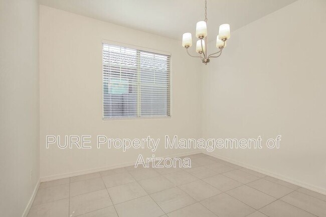 Building Photo - 3769 N 102nd Ave