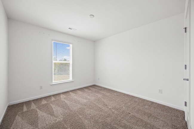 Building Photo - Spacious 3BR Townhome with Garage, Open Layout & Community Pool – Move-In Ready!