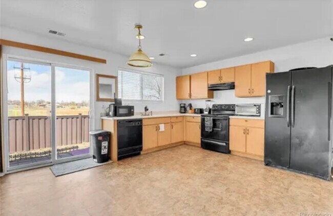 Building Photo - 2209 E 111th Dr