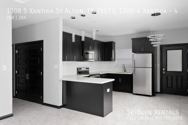Building Photo - 1308 S Xanthia St