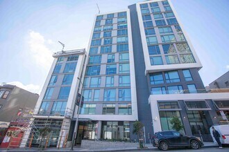 Building Photo - 2BD/2BA Modern Condo w/ Abundant Natural L...