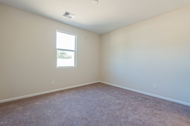 Building Photo - Beautiful New Spacious Home Includes 3 car...