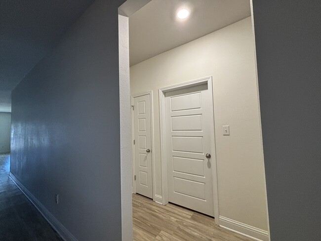 Hallway to bath and bedroom 1 and 2 - 5490 Overland Dr