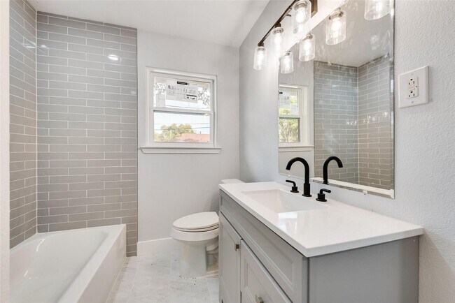Building Photo - Built for Entertaining. Designed for Living. Fresh Style. Smart Layout. Perfect Location