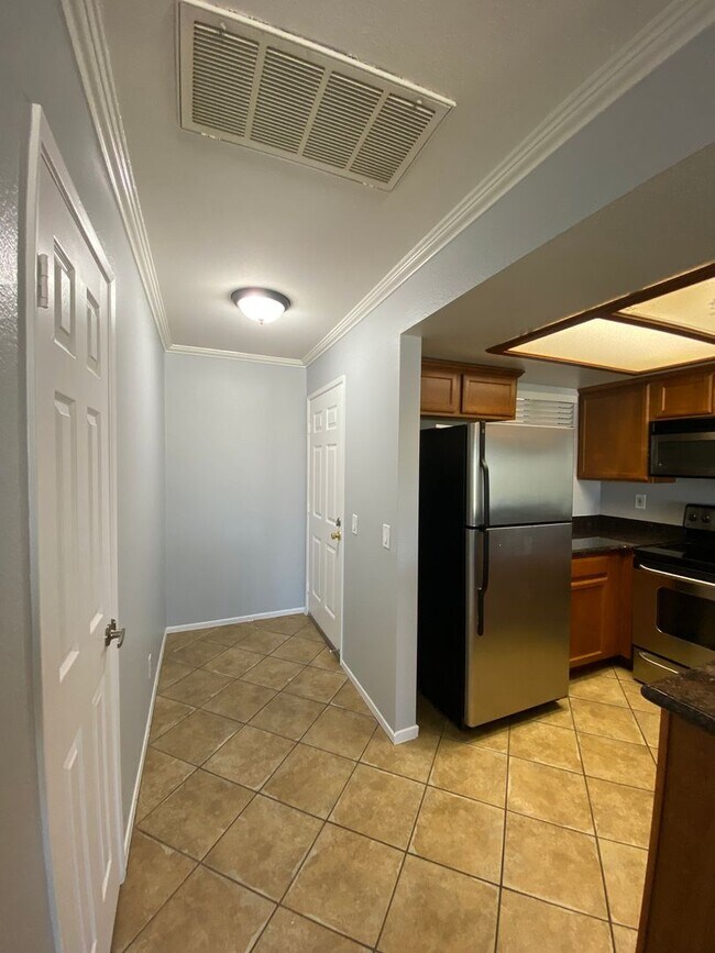 Building Photo - The Palms Condo