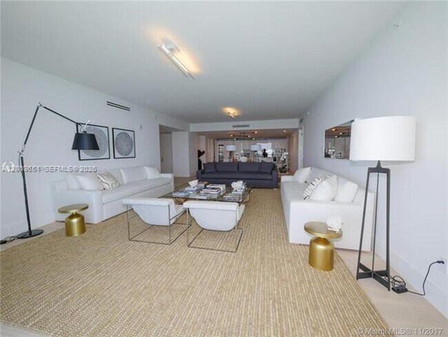 Building Photo - 10201 Collins Ave