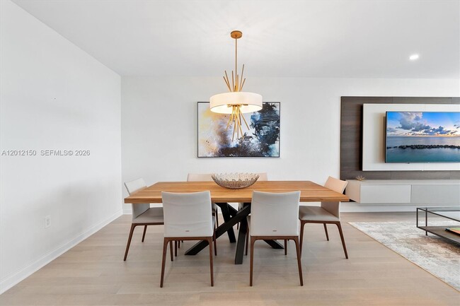 Building Photo - 10275 Collins Ave