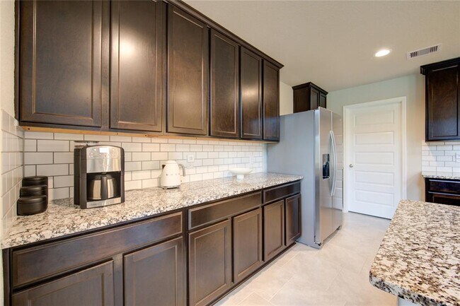 Building Photo - 9623 Japonica Dr