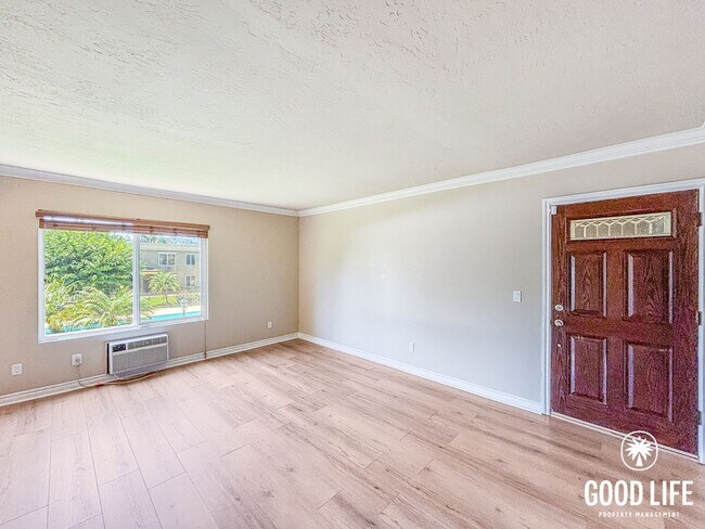 Building Photo - SD: Charming 2BD/1BA 2nd Floor Condo in El Cajon W/ A/C Unit, W/D, & 2 Reserved Parking Spots!