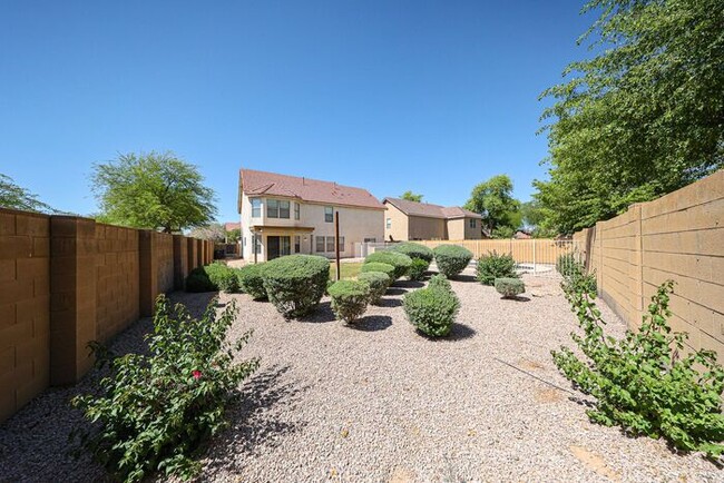 Building Photo - Introducing a stunning 4-bedroom, 2.5-bath...