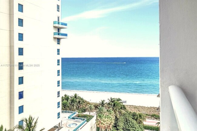 Building Photo - 5005 Collins Ave