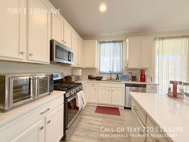 Building Photo - 7089 E 125th Ave