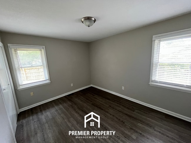 Building Photo - Spacious 4BR/2BA Home in 38118 | Hardwood Floors & Large Fenced Backyard