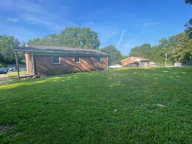 Building Photo - Newly renovated  3 bedroom 1 bath brick ranch home sitting on a large lot and on a quiet street i...
