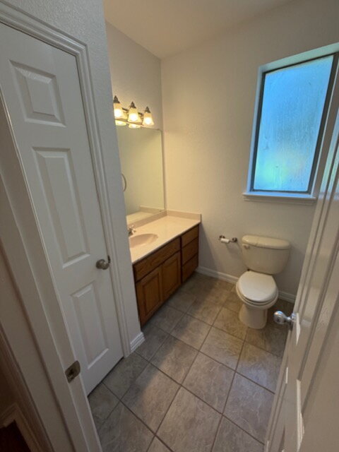 Building Photo - Former model home on corner lot is ready for move in!