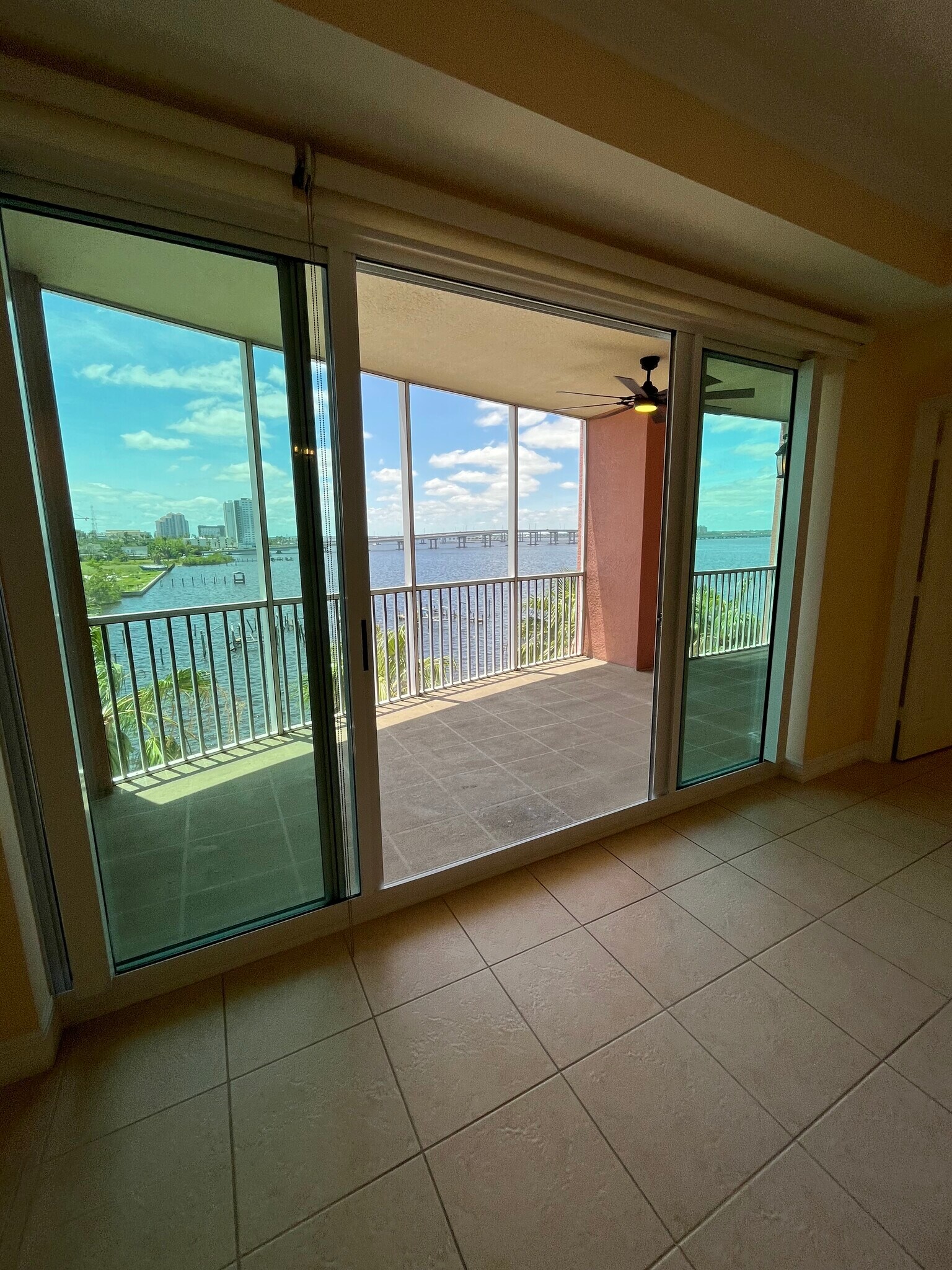 View with sliding hurricane doors wide open - 2743 1st St