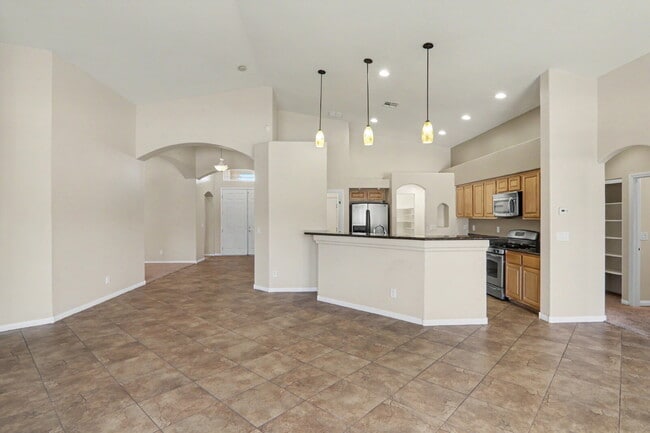 Building Photo - Immaculate 5-Bed, 3-Bath Entertainer’s Home on Over a Quarter Acre in Gated Riverwalk Ranch Manor...