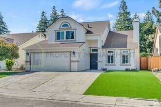 Building Photo - Completely Renovated 4-Bedroom Home with M...