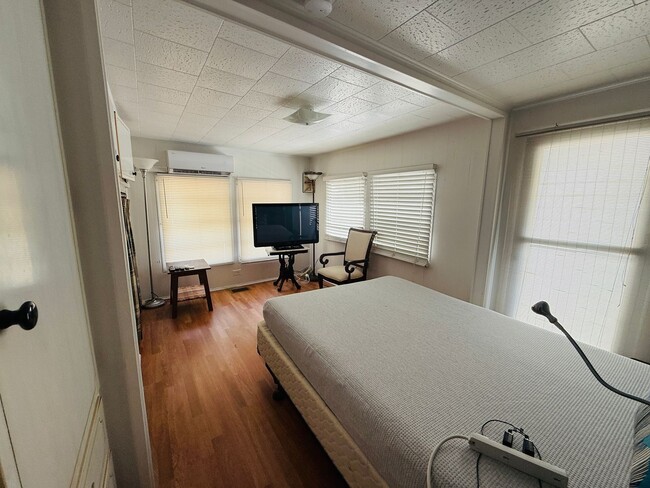 Building Photo - Beautiful fully furnished one bedroom, one bath manufactured home in a 55+ deed restricted gated ...