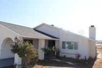 Building Photo - Spacious 3-Bedroom Home with Fireplace & 2...