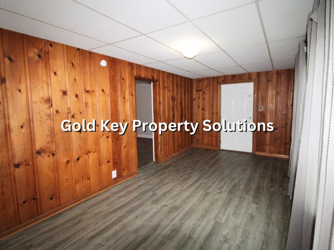 Building Photo - Large 2 BR 1 BA House with Family Room, Basement, Garage, and Separate Storage Building (SECTION ...