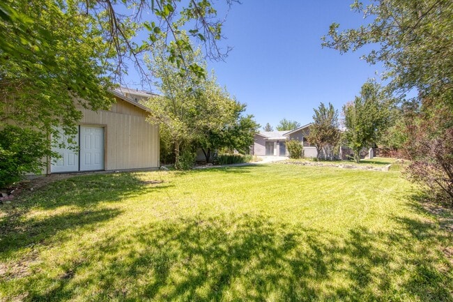 Building Photo - One Story Home with Large Detached Garage too
