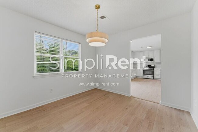 Building Photo - Updated Home with Spacious Layout & Private Backyard