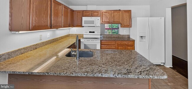 Building Photo - 9814 Rainleaf Ct