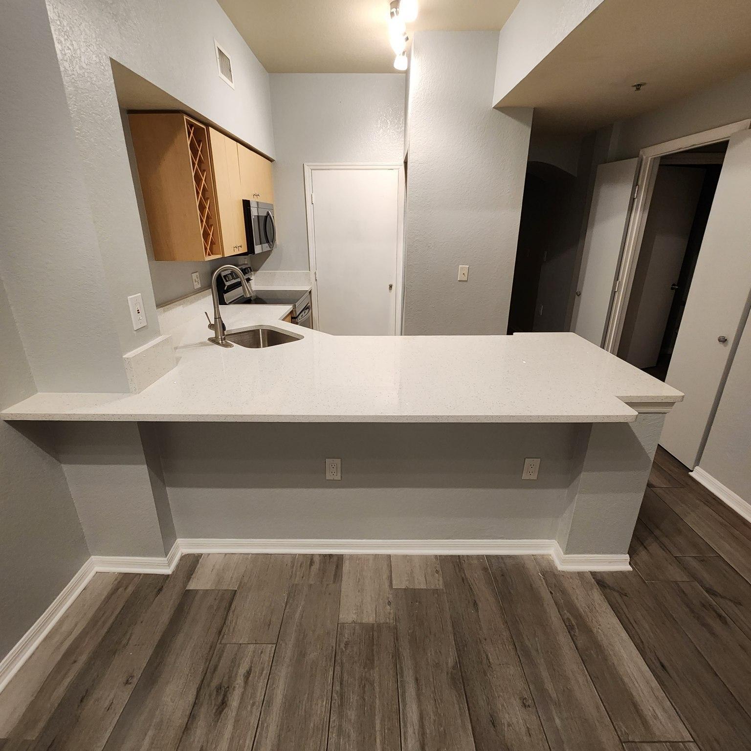 Kitchen / Laundry Room Access Door - 200 4th Ave S