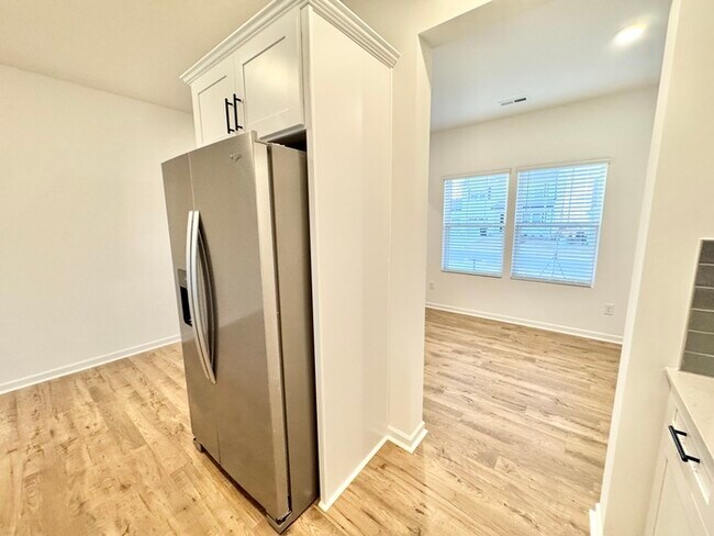 Building Photo - Three bedroom 2 1/2 bath single-family home in the new Kensington community