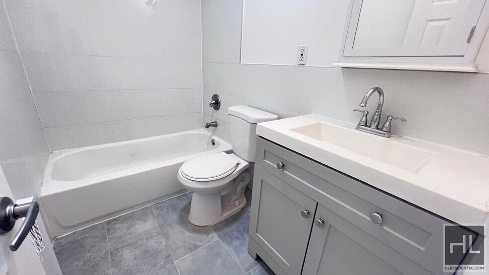 Building Photo - GUT RENOVATED VERY LARGE 3 BEDEROOMS W/ PR...