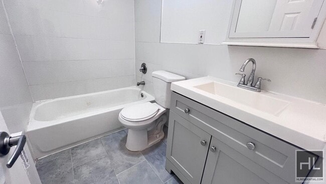 Building Photo - GUT RENOVATED VERY LARGE 3 BEDEROOMS W/ PR...