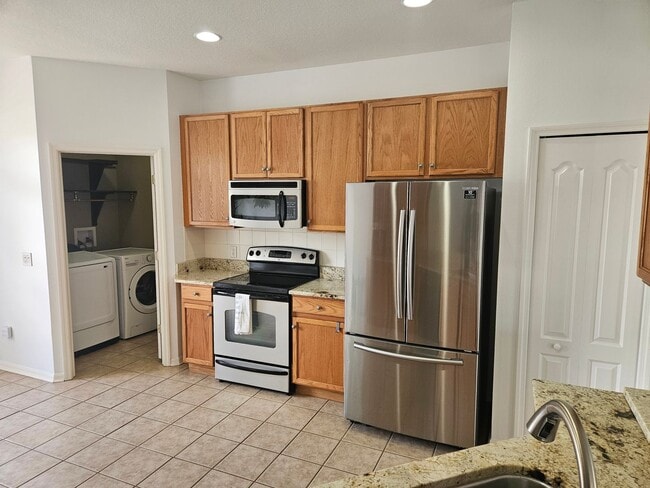Building Photo - "Move in with a 12-month lease starting No...
