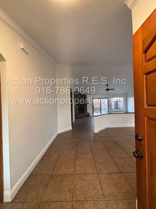 Building Photo - Action Properties RES Inc: offering Single Story, New Paint, Great Room with formal dining area, ...