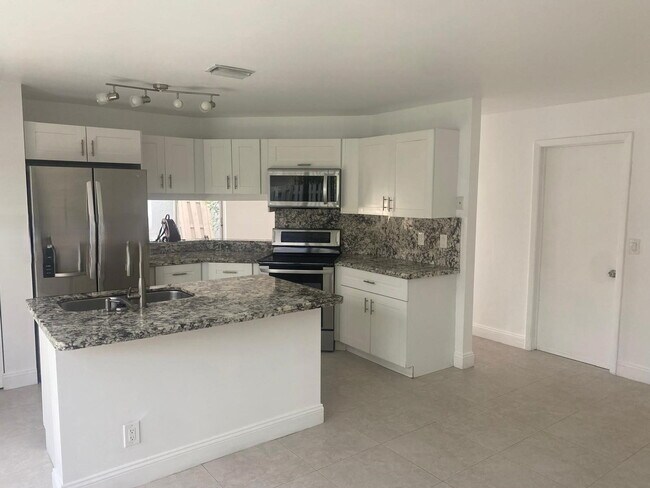 Building Photo - Northwest 107th Way, Sunrise, FL 33351 - 3 BR 2 BA single-family home