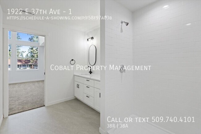 Building Photo - 1922 E 37th Ave