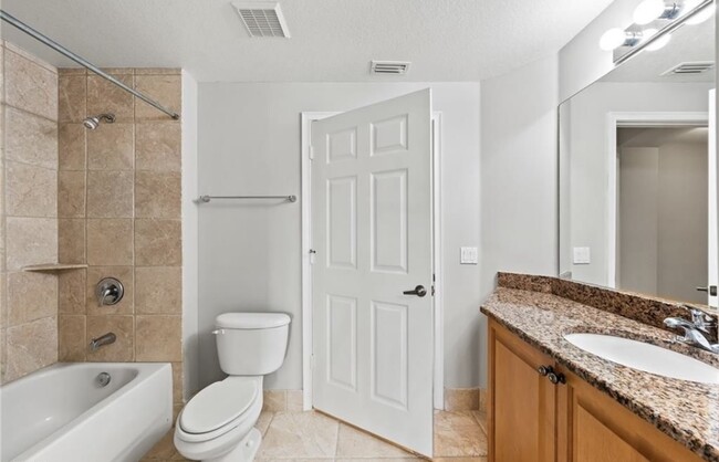 bathtub/shower common bathroom - 13141 Bella Casa Cir