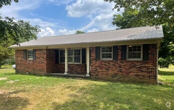 Building Photo - Timeless Brick Home with Large Yard!