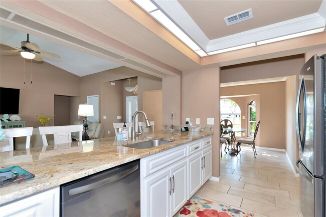 Building Photo - "3-Bedroom Oasis with Granite Accents & Mo...