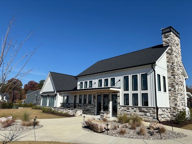 Building Photo - Beautiful 3 Bed+Bonus+2 Car Garage Townhome in New Wake Forest Community